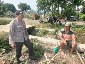 Bhabinkamtibmas Sosialisasikan Program Ketahanan Pangan ke Petani Jagung Demi Dukung Asta Cita Pemerintah